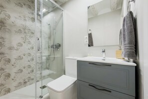 Hair dryer, towels, soap, toilet paper