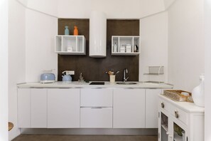 Appartement, 1 slaapkamer | Privékeuken | Een waterkoker