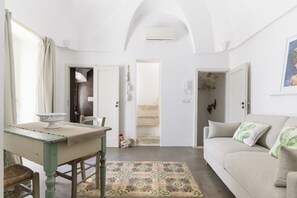 Apartment, 1 Bedroom | Living area | 30-inch TV with satellite channels - Terrazza panoramica Cavour by Wonderful Italy (Ostuni)