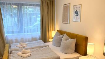 1 Schlafzimmer, BĂŒgeleisen/BĂŒgelbrett, Reisekinderbett, kostenloses WLAN