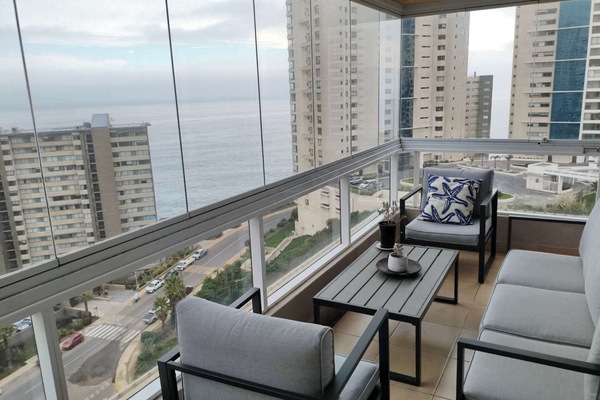Relax on the private balcony with breathtaking ocean views, perfect for unwinding with a morning coffee or evening drink.