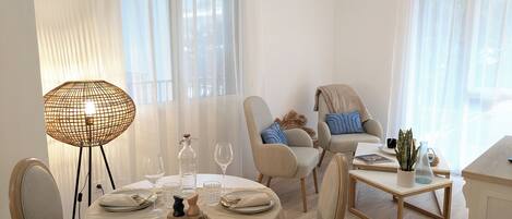 Comfort Apartment | Living area | 43-inch flat-screen TV with digital channels