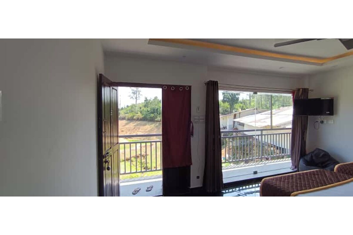 Chambre Double Deluxe | Coin séjour