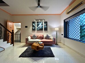 Deluxe Apartment, 2 Bedrooms, Non Smoking, Air conditioning | Living area | 40-inch Smart TV with digital channels - StayLeisurely Boutique suites Lonavala (Lonavala)