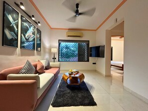 Deluxe Apartment, 2 Bedrooms, Non Smoking, Air conditioning | Living area | 40-inch Smart TV with digital channels - StayLeisurely Boutique suites Lonavala (Lonavala)