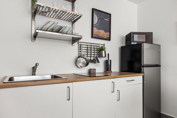 Fridge, microwave, stovetop, coffee/tea maker