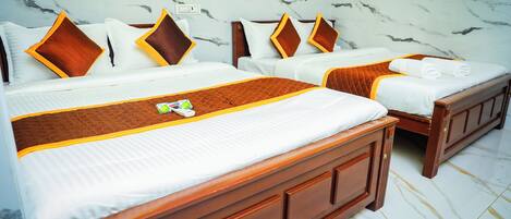 Deluxe Quadruple Room | Bed sheets