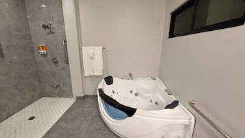 Jetted tub, hair dryer, towels, soap