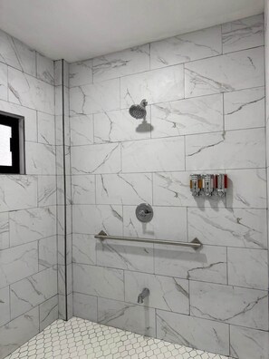 Shower, hair dryer, towels, soap