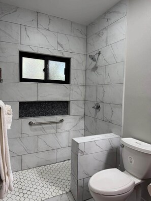 Shower, hair dryer, towels, soap