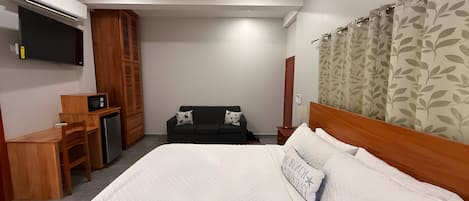 1 dormitorio, caja fuerte, tabla de planchar con plancha y wifi
