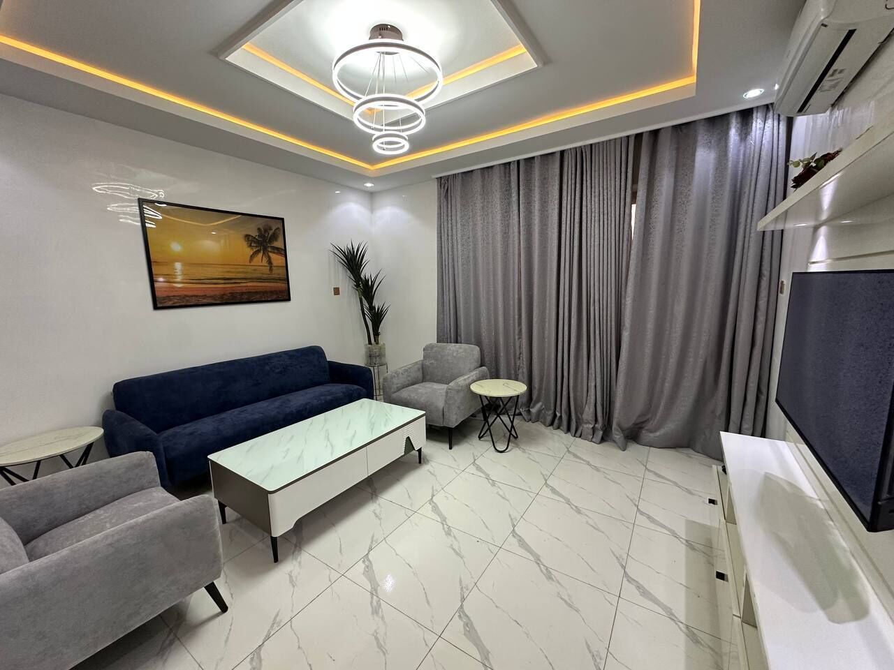 Luxury-Apartment, 1 Schlafzimmer, Balkon, Stadtblick | Wohnbereich