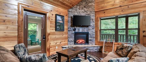 Una televisión, una chimenea, videojuegos