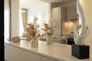 Deluxe Apartment, City View | Living area | 150-inch Smart TV with satellite channels, Netflix, streaming services