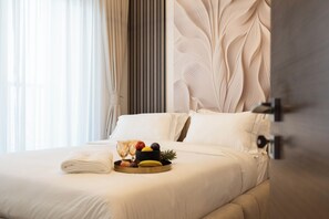 Deluxe Apartment, City View | Premium bedding, memory foam beds, in-room safe, blackout drapes