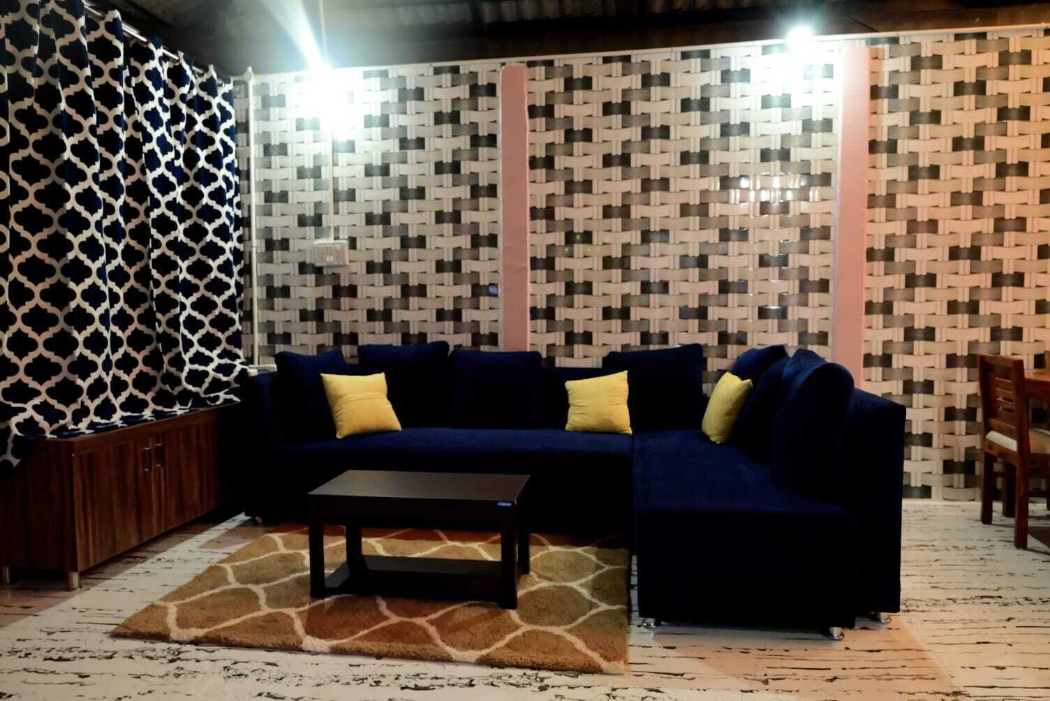 Deluxe Villa, Lake View | Living area | TV