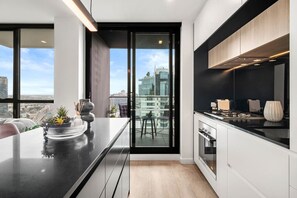 Fridge, microwave, oven, stovetop - Stylish 1BR Southbank | City Views | Walk to Crown (Southbank)