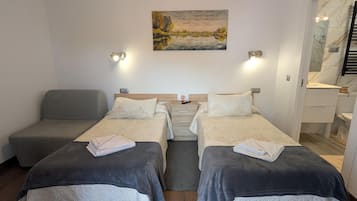Een strijkplank/strijkijzer, gratis wifi, beddengoed