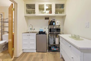 Microwave, coffee/tea maker, cookware/dishes/utensils