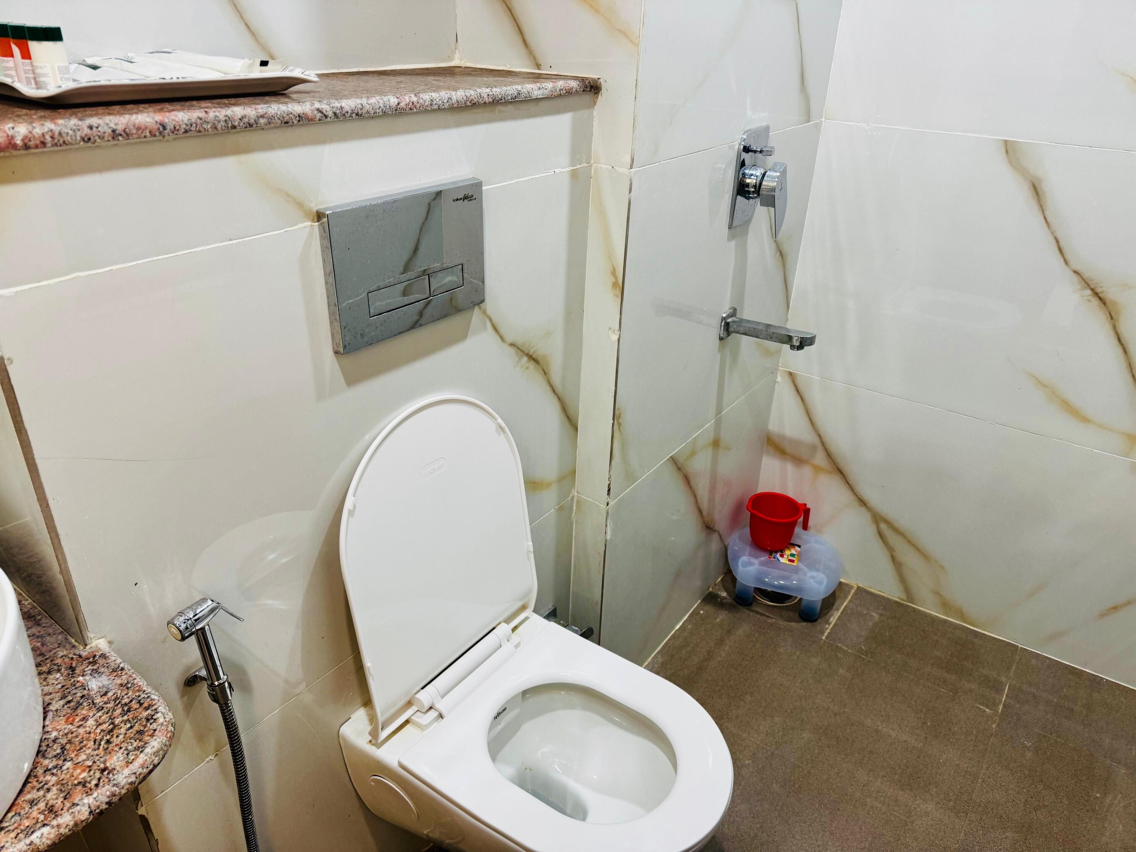 Shower, slippers, towels, soap