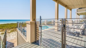 A rooftop terrace with a pool, overlooking a beach. - NEW Rental!!! Viviana 11 - Private Pool Beach Front Home - Sleeps 14 (Perdido Key)