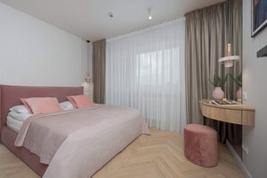 1 bedroom, desk, iron/ironing board, travel crib
