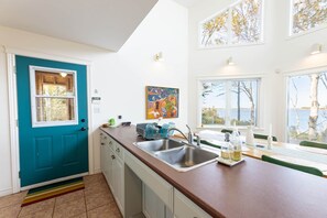 Fridge, microwave, oven, stovetop - Owl's Landing: Bright 3-Bed Coastal Home with Loft, Screen Room & Ocean Views (Prince Edward Island)