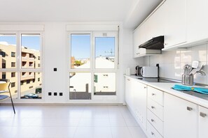 Microwave, stovetop, coffee/tea maker, toaster