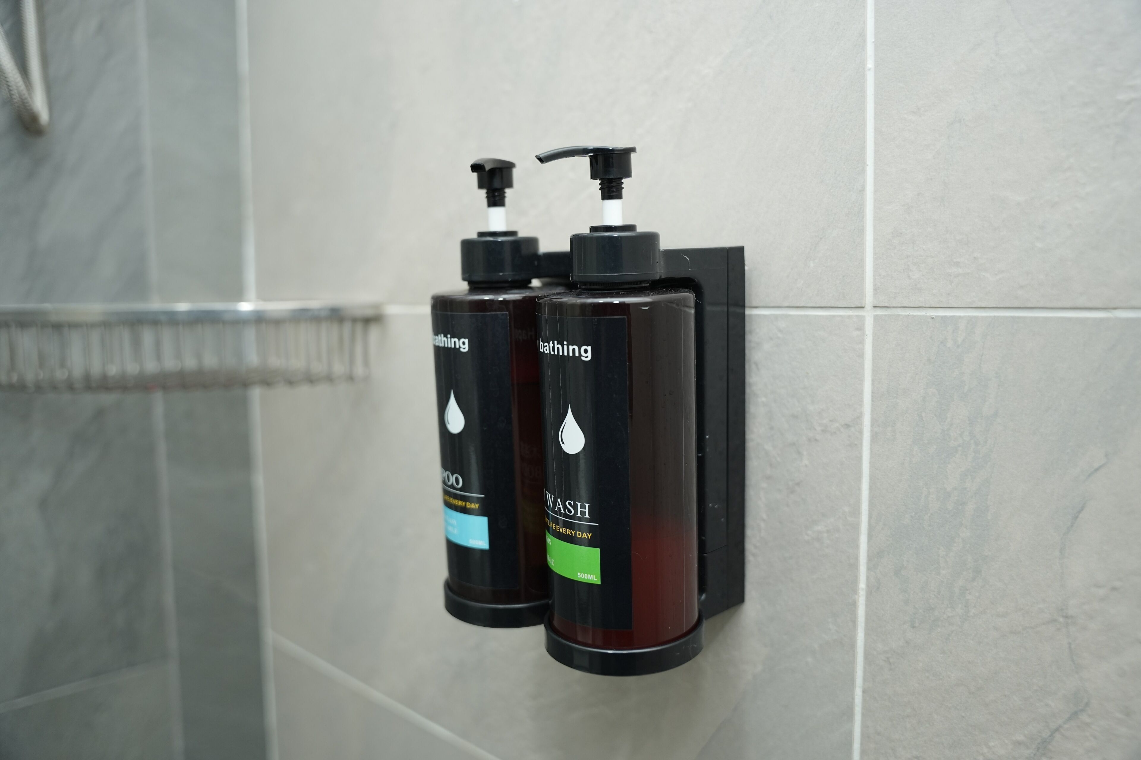 Shower, hair dryer, towels, toilet paper