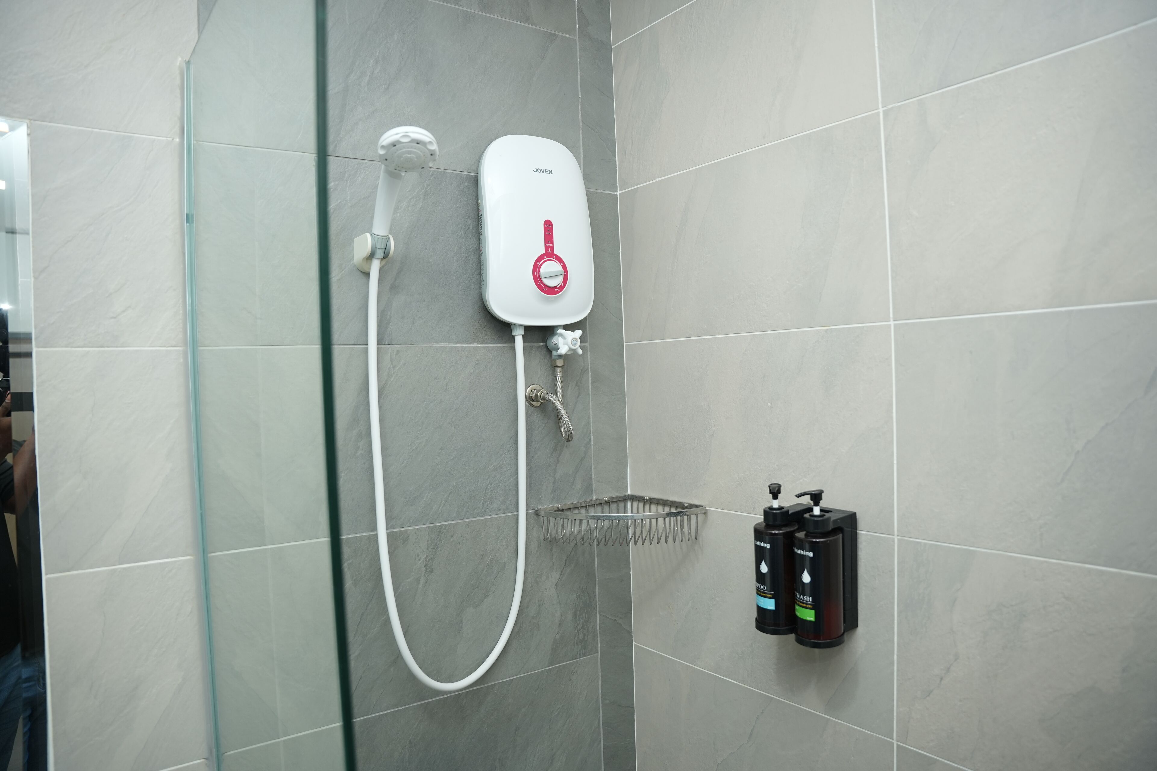 Shower, hair dryer, towels, toilet paper