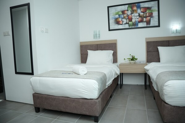 Kahden hengen standard-huone (kaksi sänkyä) | Työpöytä, ilmainen Wi-Fi, vuodevaatteet