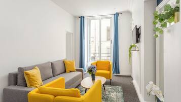 Apartment | Living area | 32-inch Smart TV with cable channels, Netflix, streaming services