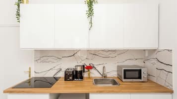 Apartment | Private kitchen | Fridge, microwave, stovetop, toaster