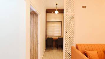 Luxury Apartment, Balcony, City View | In-room dining