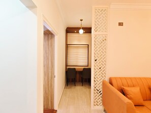 Luxury Apartment, Balcony, City View | In-room dining