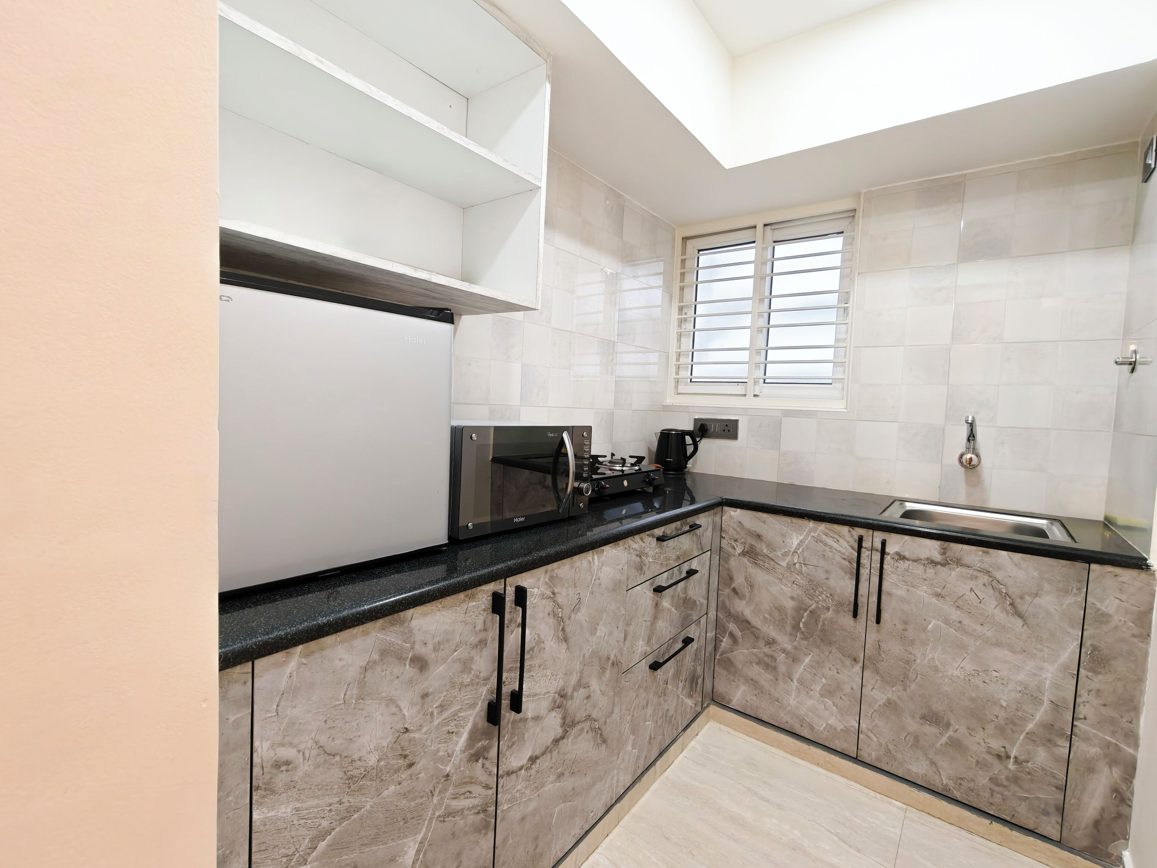 Luxury Apartment | Private kitchen | Fridge, microwave, stovetop, cookware/dishes/utensils