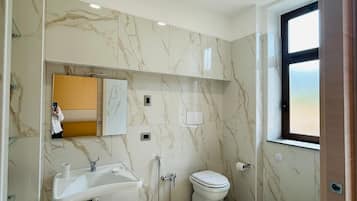 Hair dryer, towels, soap, toilet paper