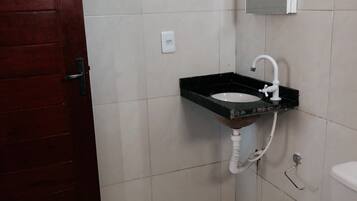 Shower, towels, toilet paper