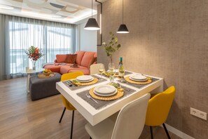 Departamento, vista a la ciudad | Área de sala de estar