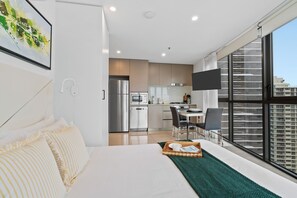 Iron/ironing board, travel crib, WiFi, bed sheets