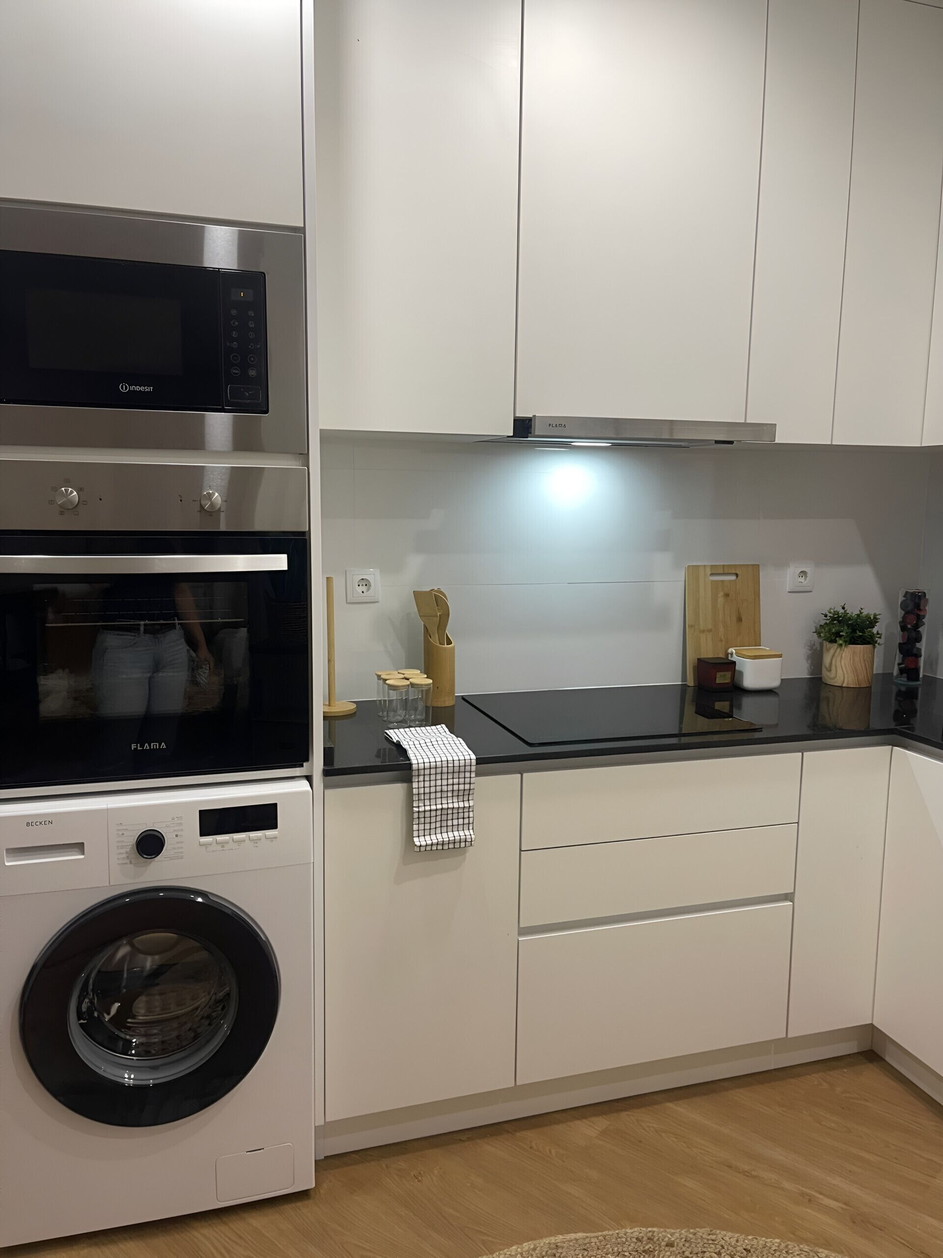 Microwave, dishwasher, coffee/tea maker, cookware/dishes/utensils