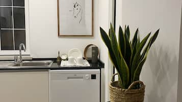 Coffee/tea maker, microwave, dishwasher, cookware/dishes/utensils