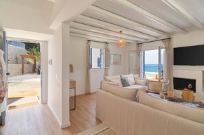 TV, fireplace - Villa Astrofegia | Moonlit Escape with Sea Views (Polis)