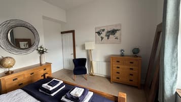 2 dormitorios, tabla de planchar con plancha, wifi gratis y ropa de cama