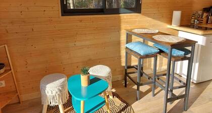 Chalet et sa terrasse perchée dans les arbres