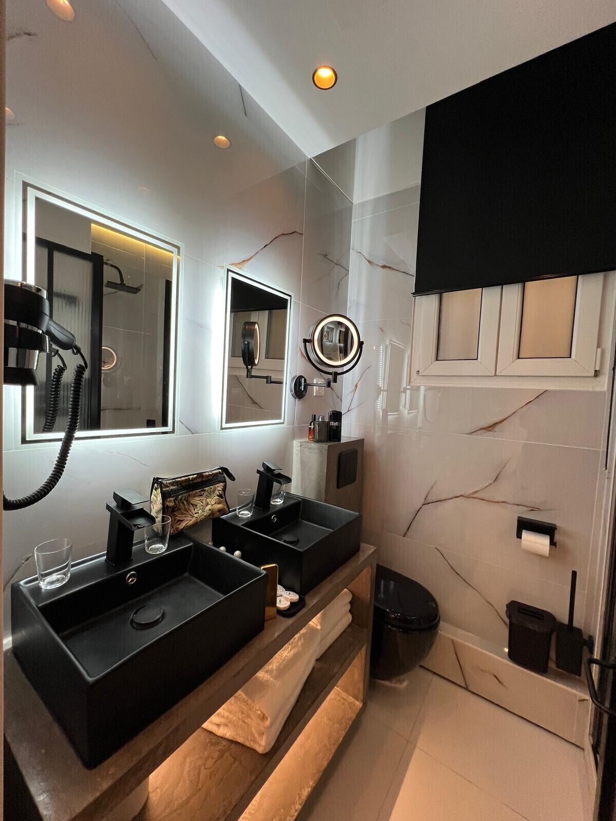 Shower, hair dryer, towels, toilet paper
