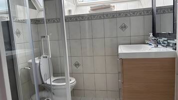 Regadera y secadora de cabello