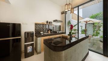 Fridge, microwave, stovetop, coffee/tea maker