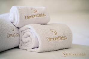 Hair dryer, towels, soap, shampoo