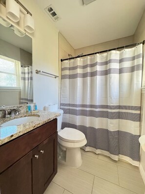 Hair dryer, towels, soap, toilet paper